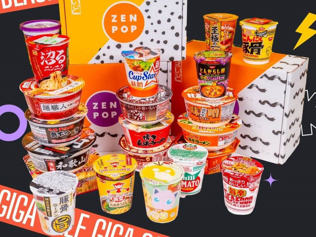 Several Zenpop boxes with many ramen cups and bowls in front