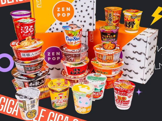 Several Zenpop boxes with many ramen cups and bowls in front